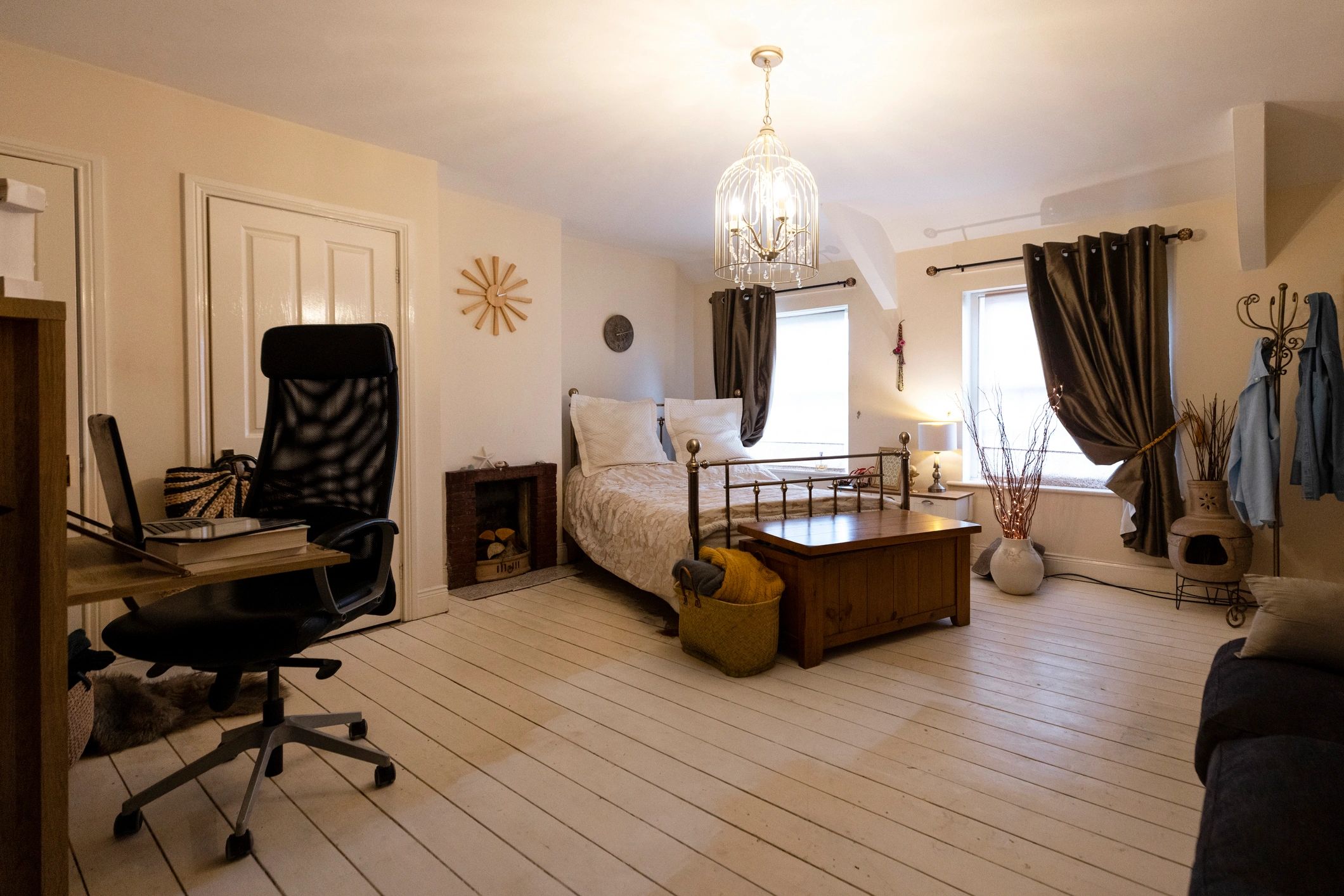 Finished bedroom interior with smooth walls and ceiling