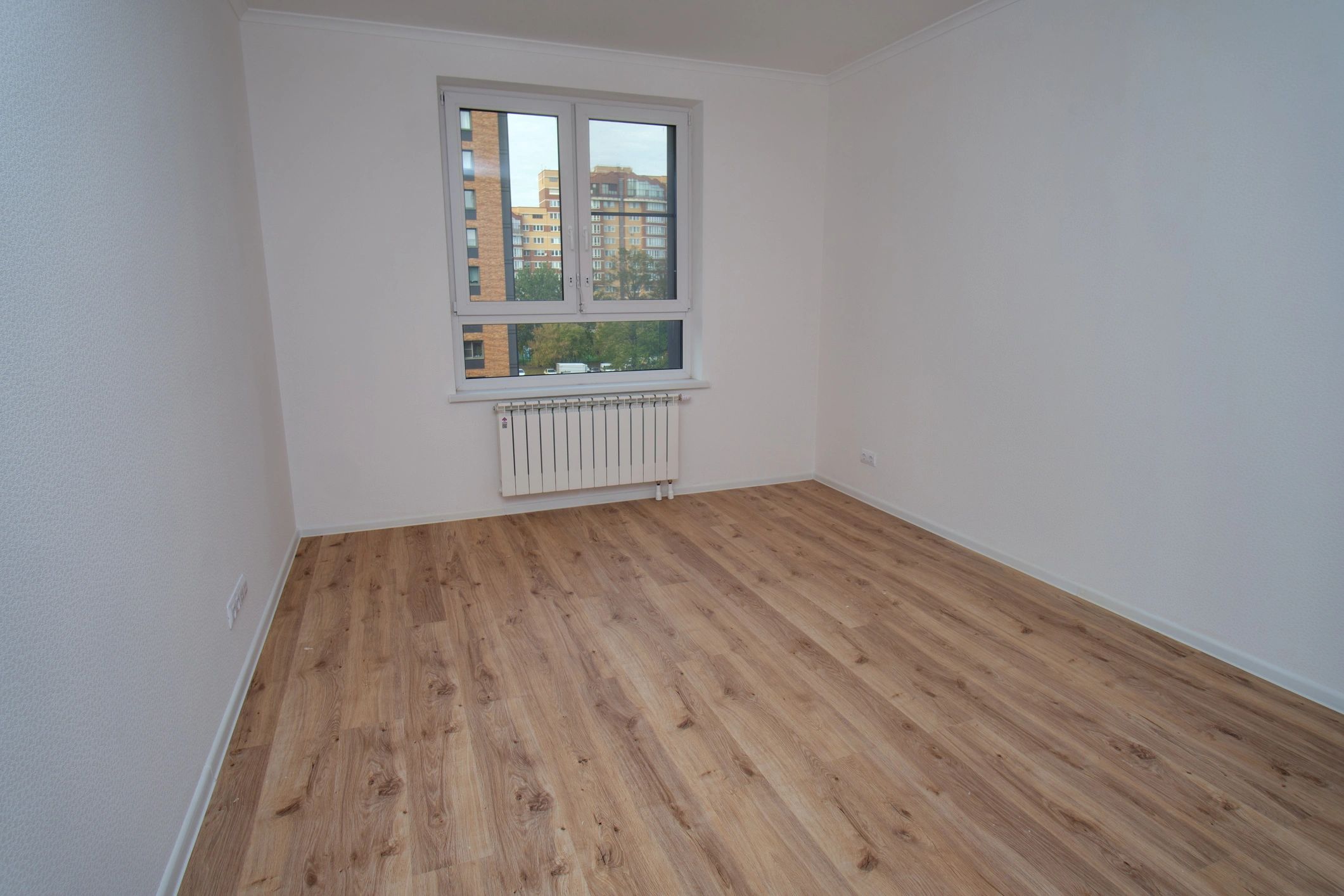 Minimal renovated room with smooth finished walls