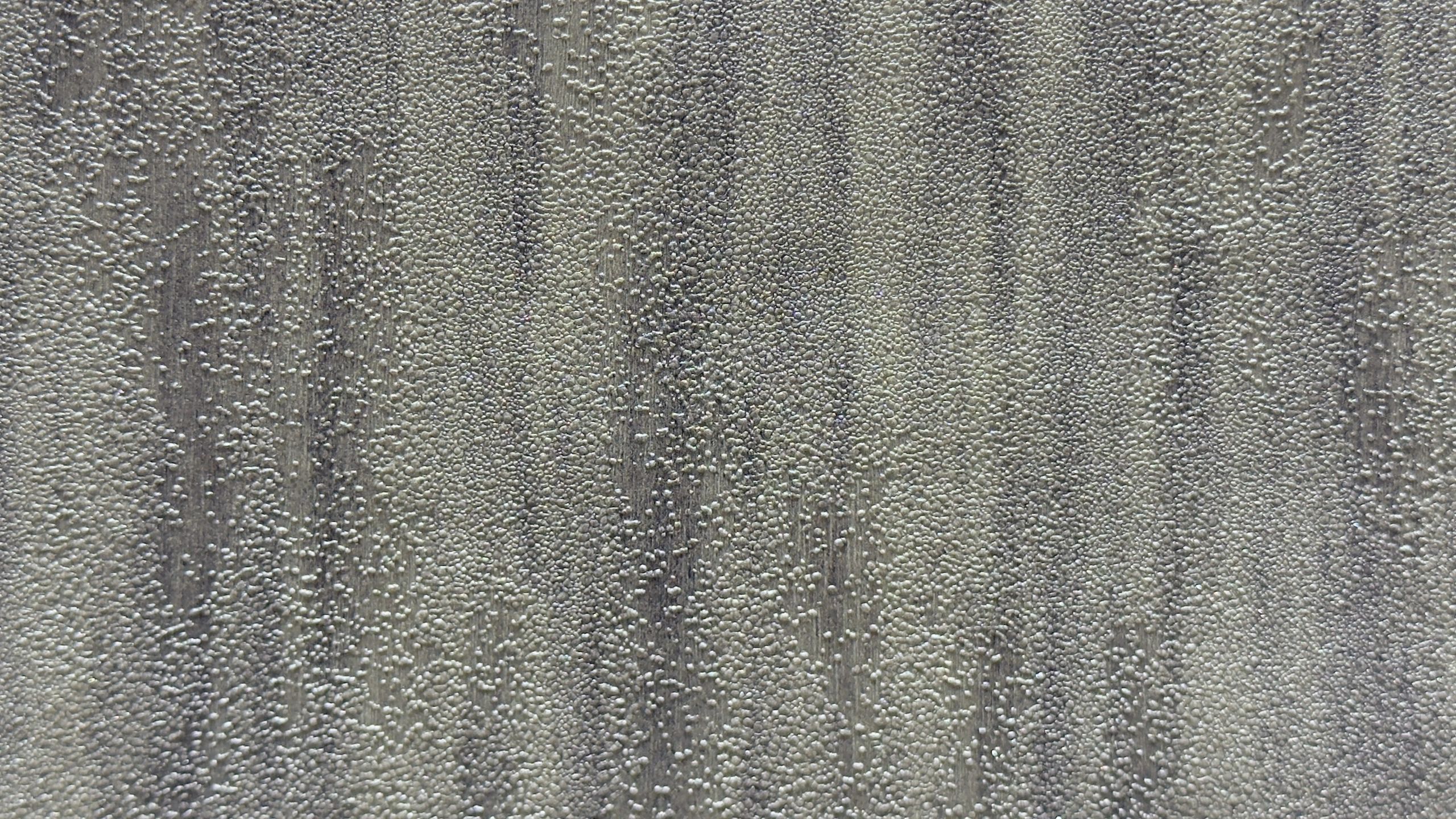 Refined textured finish for modern shower wall surfaces
